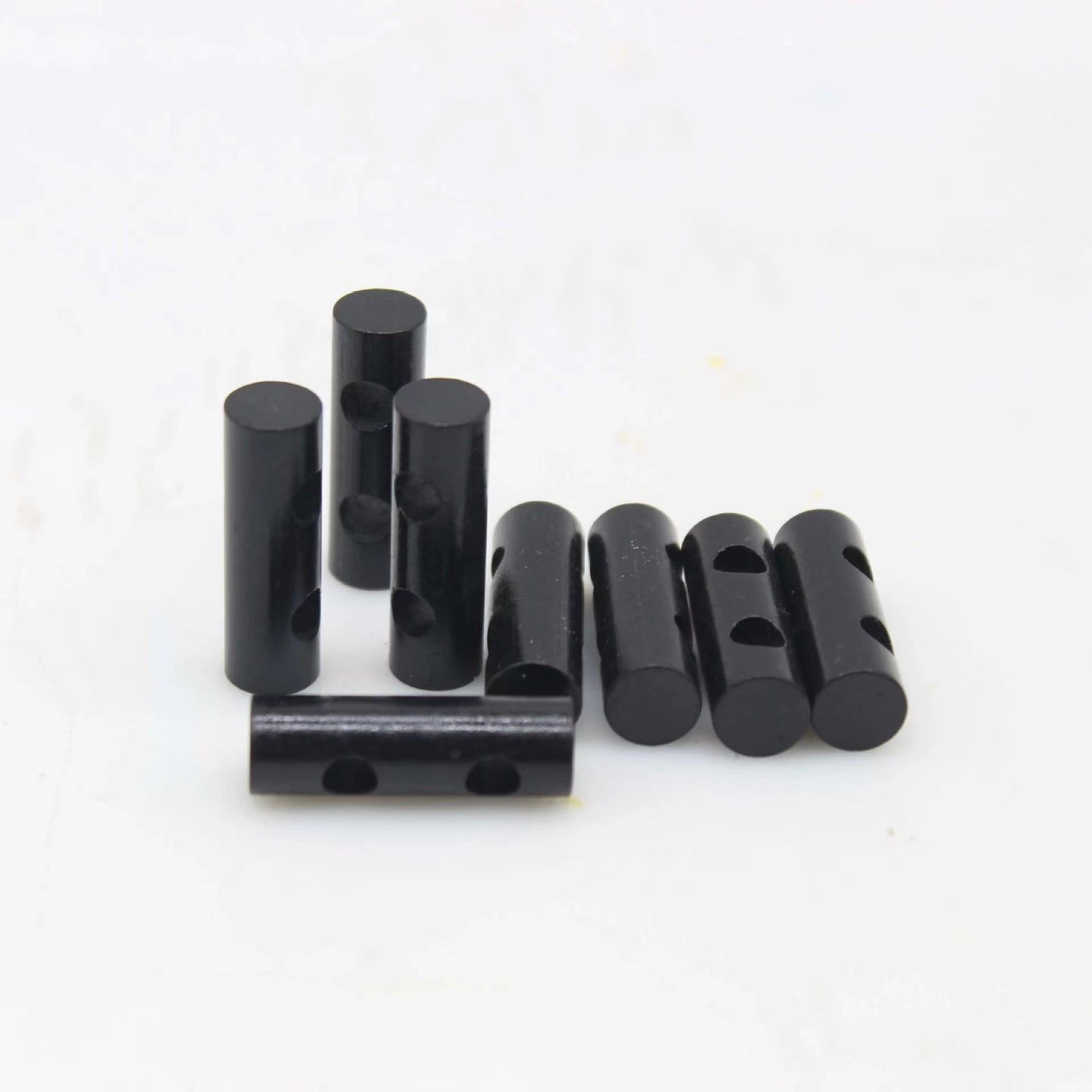 Mini-Feuerstein mit Doppelloch – Outdoor Survival Feuerstab